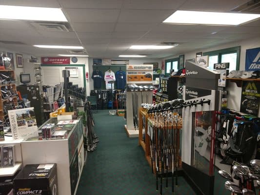 Mulligan's Golf Shop wall of irons
